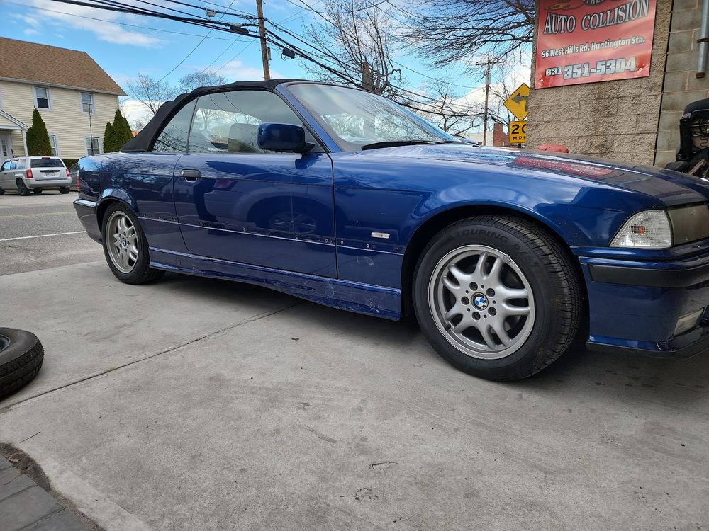 Blue BMW convertible outside West Hills Complete Car Care